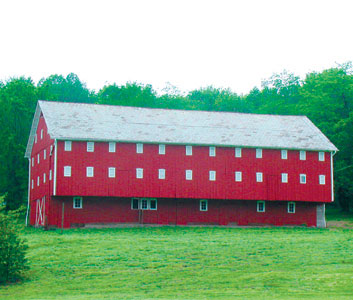 The 1861 Christian Pershing Barn at the Norma Johnson Center located on the Conservation Side is on The National Historic Registry in 1991 by the Department of Interior. This barn contains the architectural features associated with the Switzer Barn type. The building maintains a high degree of historic integrity and is a rare example of this type in Tuscarawas County. Originally from Germany the Pershing Family settled in York County, PA in 1749. He married and took barn building up as a profession. Christian Pershing, JR. lived from 1786-1866.